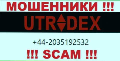 У UTradex далеко не один телефонный номер, с какого поступит звонок неизвестно, будьте крайне бдительны